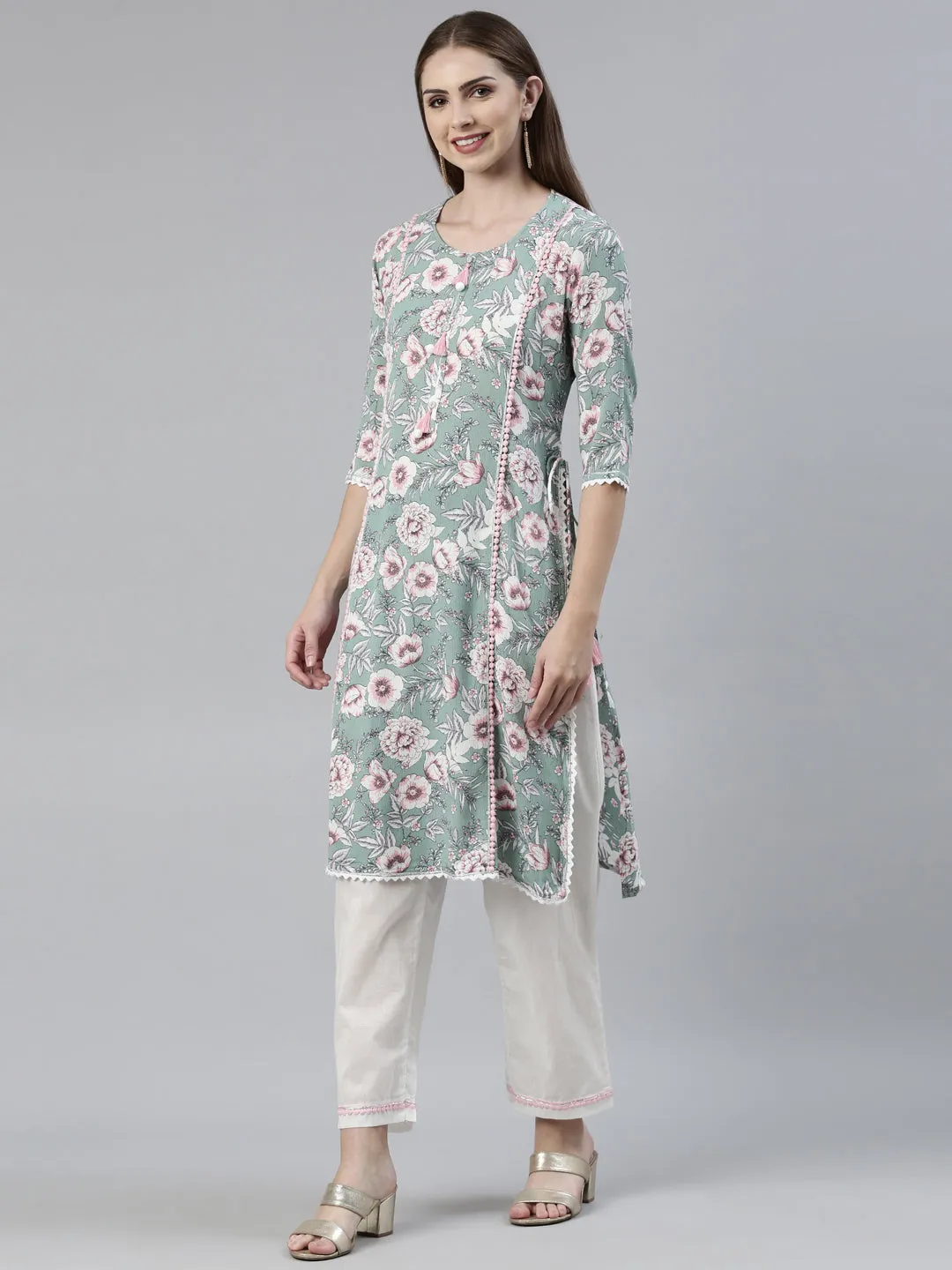 Neeru's Green Regular Knee Length Printed Kurta Solid Trousers