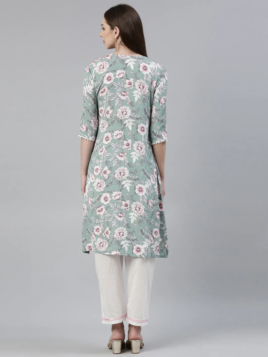 Neeru's Green Regular Knee Length Printed Kurta Solid Trousers